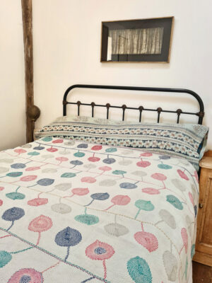Exquisite vintage Kantha quilt featuring authentic hand-stitched Indian patchwork, responsibly sourced and perfect as unique homeware.