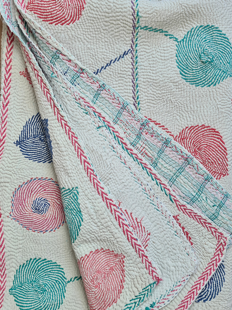 Exquisite vintage Kantha quilt featuring authentic hand-stitched Indian patchwork, responsibly sourced and perfect as unique homeware.