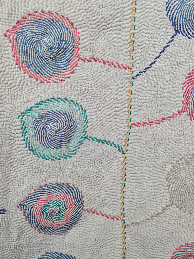 Exquisite vintage Kantha quilt featuring authentic hand-stitched Indian patchwork, responsibly sourced and perfect as unique homeware.