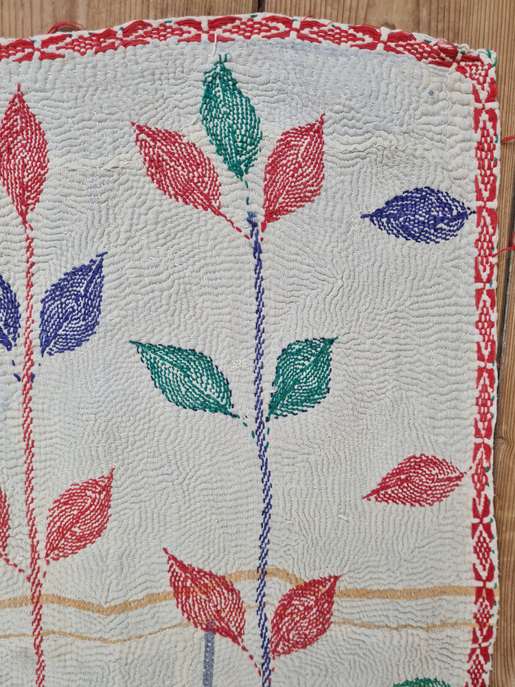 Exquisite vintage Kantha quilt featuring authentic hand-stitched Indian patchwork, responsibly sourced and perfect as unique homeware.