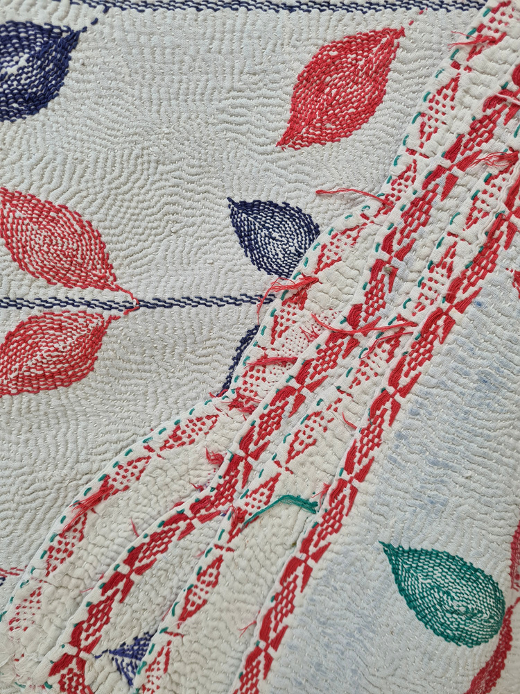 Exquisite vintage Kantha quilt featuring authentic hand-stitched Indian patchwork, responsibly sourced and perfect as unique homeware.