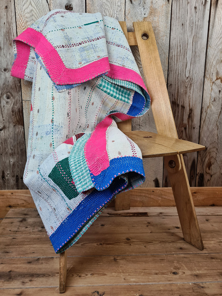 Exquisite vintage Kantha quilt featuring authentic hand-stitched Indian patchwork, responsibly sourced and perfect as unique homeware.