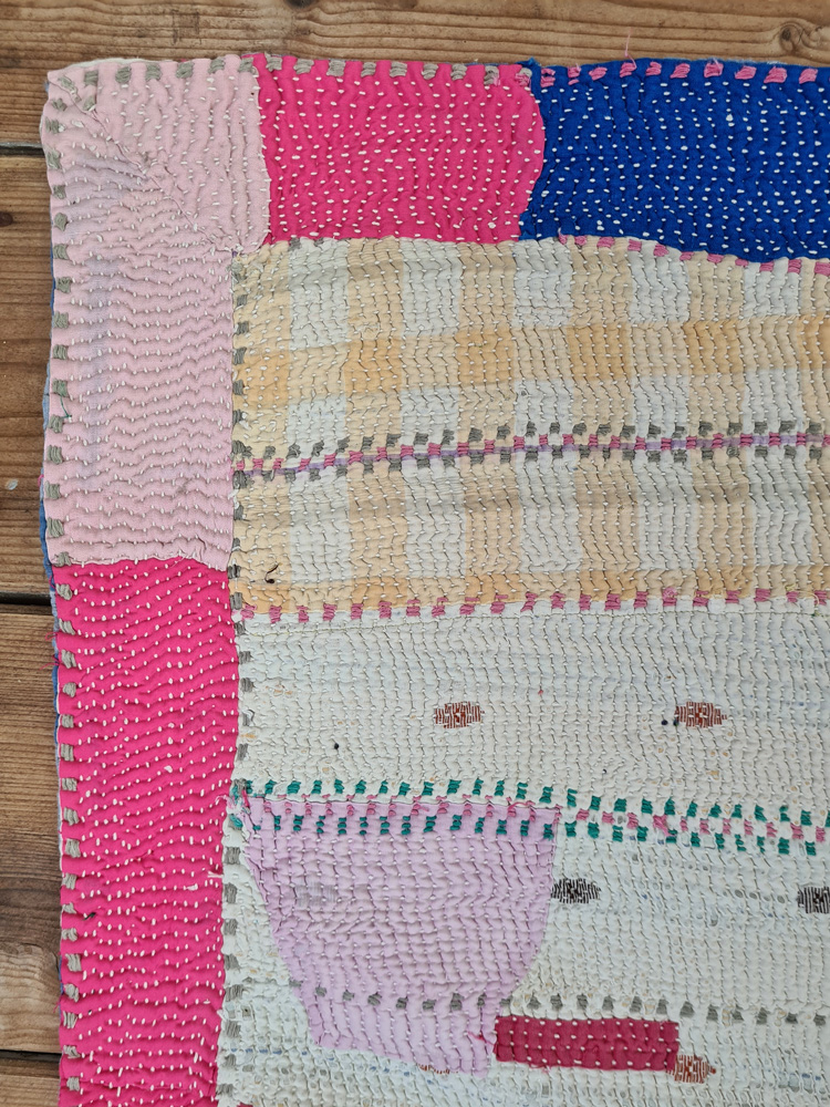 Exquisite vintage Kantha quilt featuring authentic hand-stitched Indian patchwork, responsibly sourced and perfect as unique homeware.