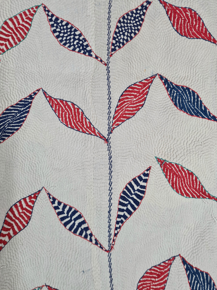 Exquisite vintage Kantha quilt featuring authentic hand-stitched Indian patchwork, responsibly sourced and perfect as unique homeware.