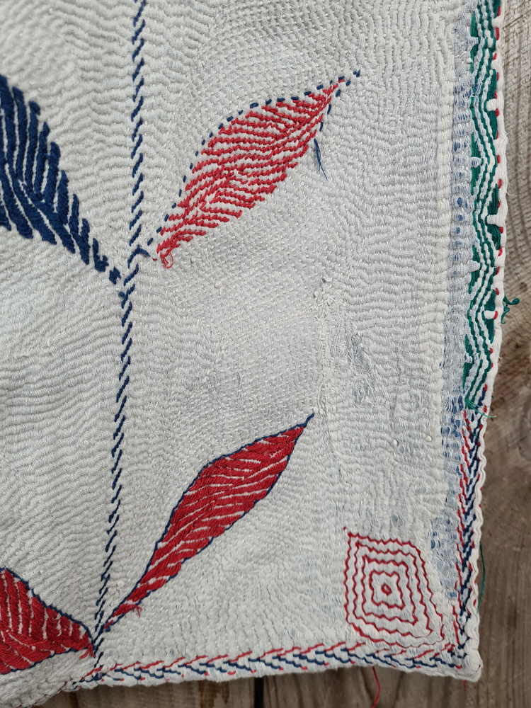 Exquisite vintage Kantha quilt featuring authentic hand-stitched Indian patchwork, responsibly sourced and perfect as unique homeware.