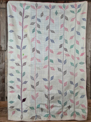 Exquisite vintage Kantha quilt featuring authentic hand-stitched Indian patchwork, responsibly sourced and perfect as unique homeware.