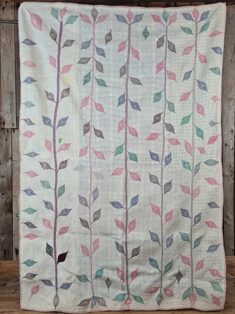 Exquisite vintage Kantha quilt featuring authentic hand-stitched Indian patchwork, responsibly sourced and perfect as unique homeware.