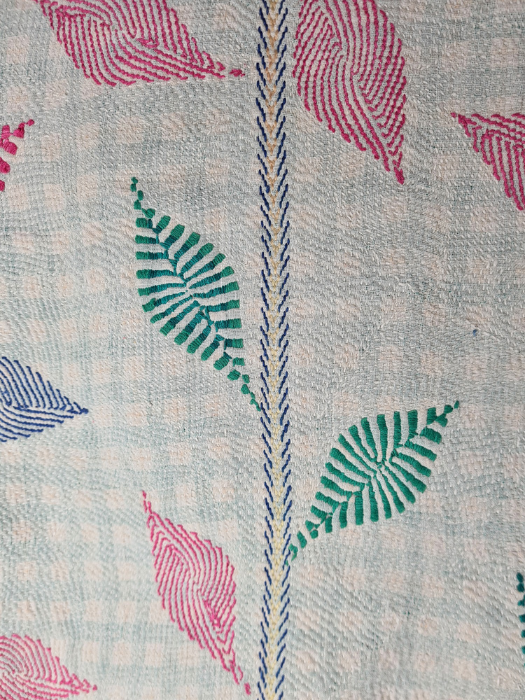Exquisite vintage Kantha quilt featuring authentic hand-stitched Indian patchwork, responsibly sourced and perfect as unique homeware.