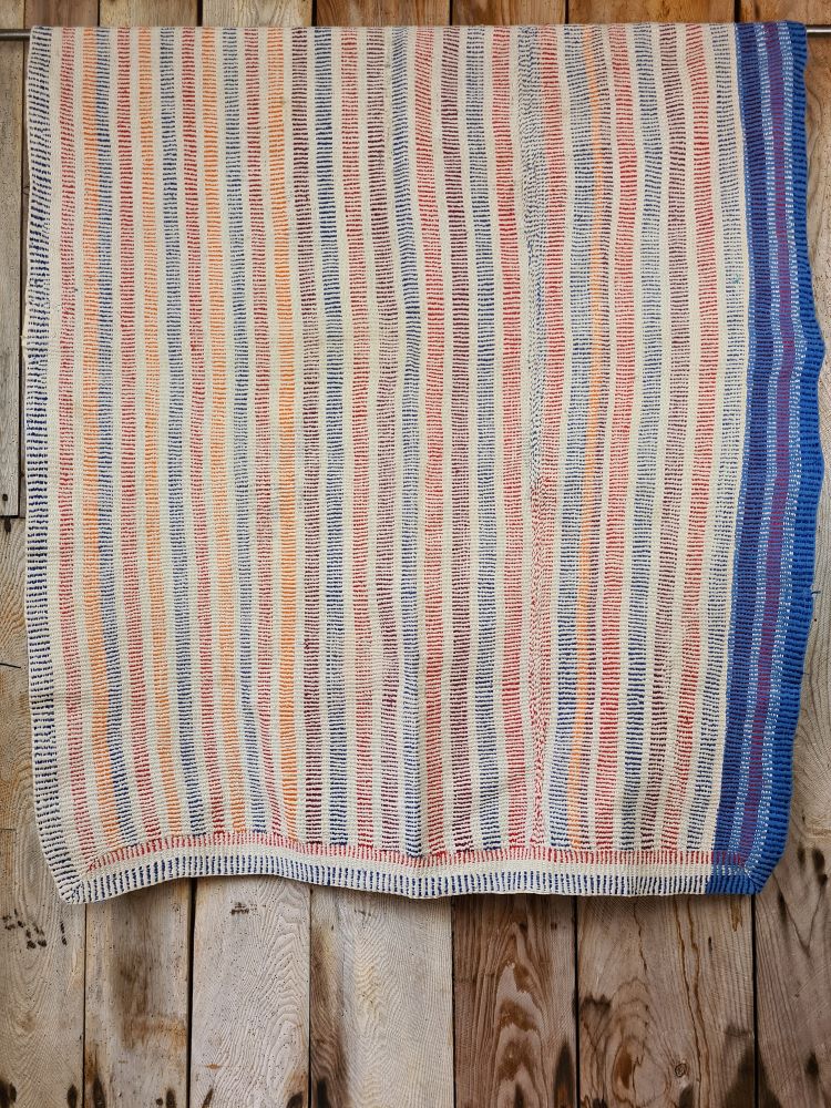 Exquisite vintage Kantha quilt featuring authentic hand-stitched Indian patchwork, responsibly sourced and perfect as unique homeware.