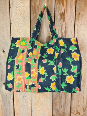 Colourful cotton kantha bags, pockets and purses, great for organising the smaller things in life. Made from recycled kantha quilts for the perfect accessory.