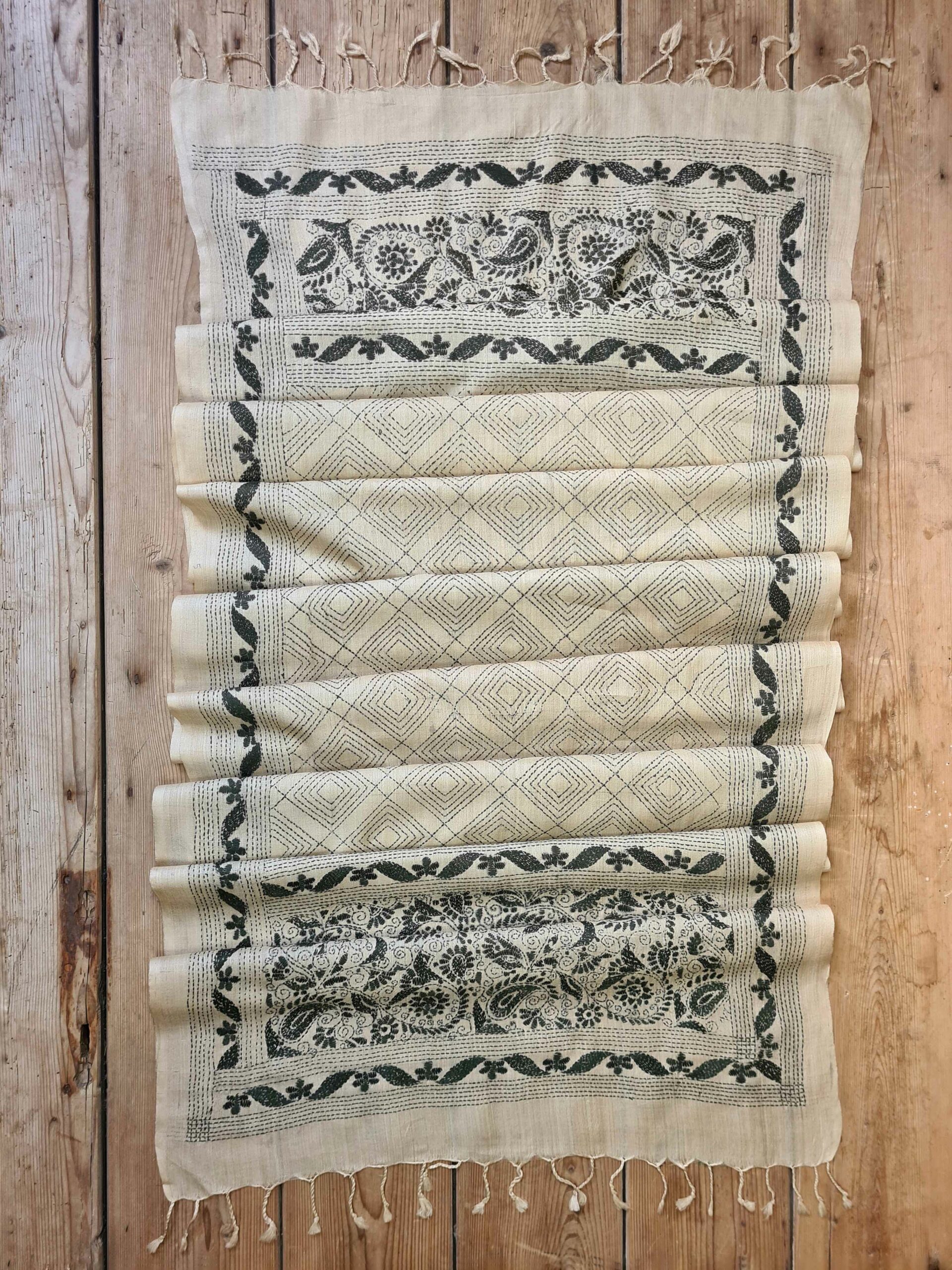 A tussar silk scarf/shawl hand-embroidered with traditional motifs by a NGO in West Bengal