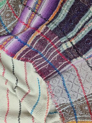 Exquisite vintage Kantha quilt featuring authentic hand-stitched Indian patchwork, responsibly sourced and perfect as unique homeware.