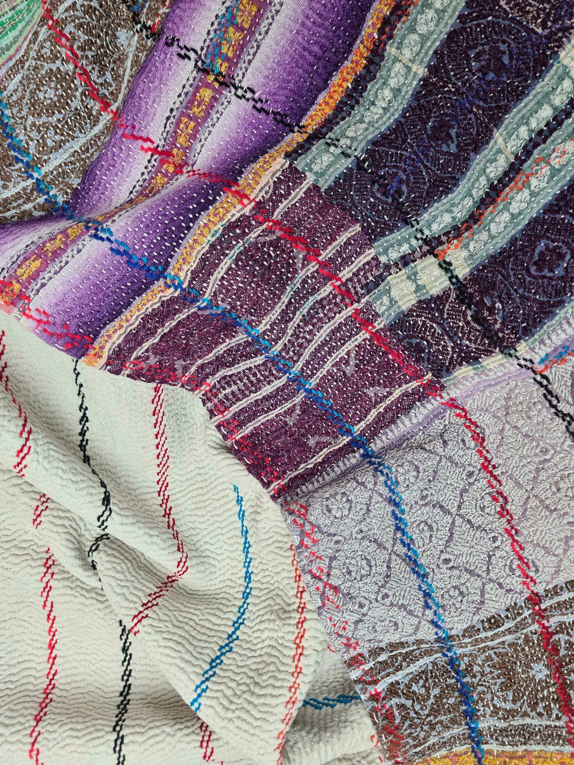 Exquisite vintage Kantha quilt featuring authentic hand-stitched Indian patchwork, responsibly sourced and perfect as unique homeware.