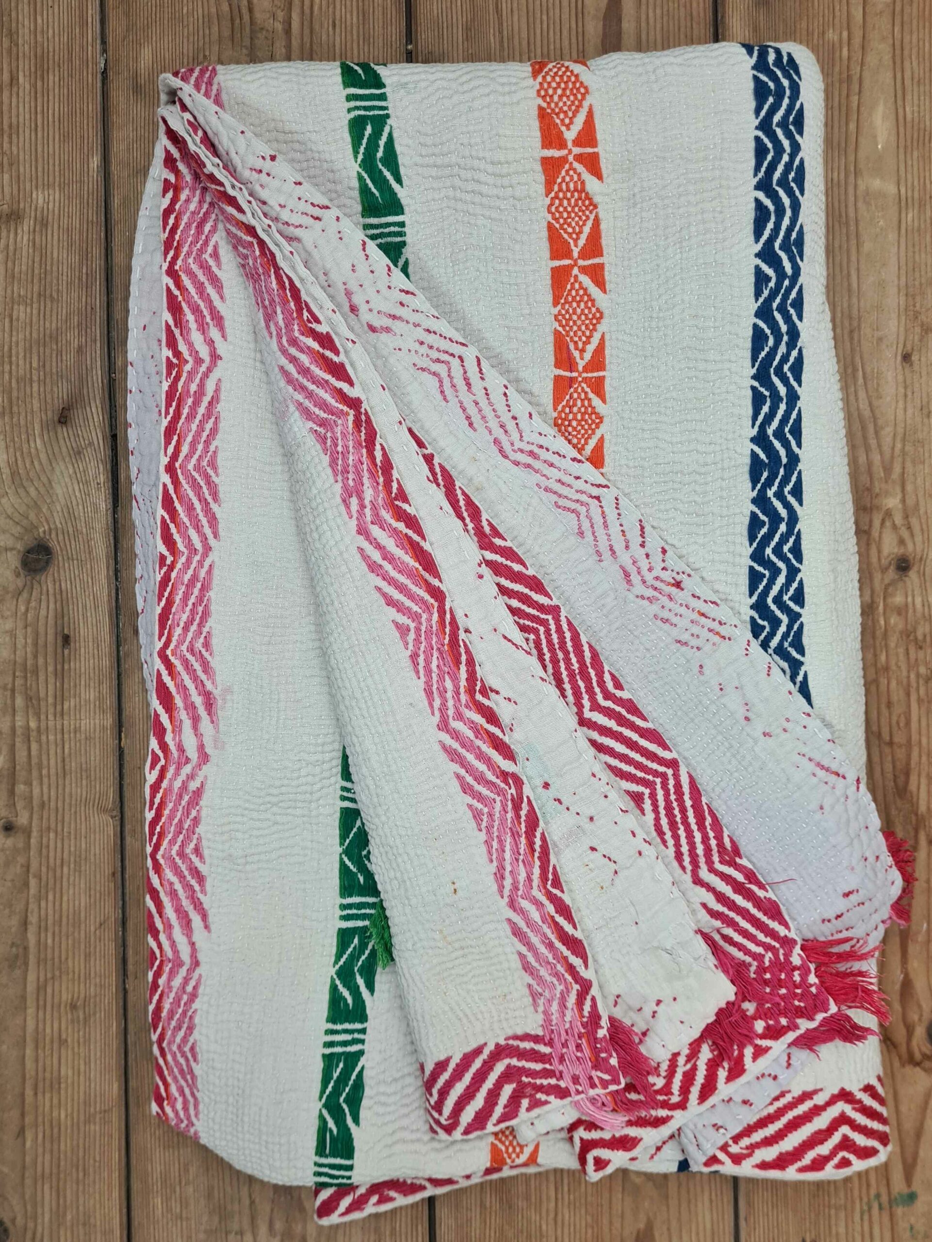 Exquisite vintage Kantha quilt featuring authentic hand-stitched Indian patchwork, responsibly sourced and perfect as unique homeware.