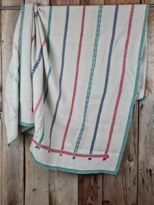 Exquisite vintage Kantha quilt featuring authentic hand-stitched Indian patchwork, responsibly sourced and perfect as unique homeware.