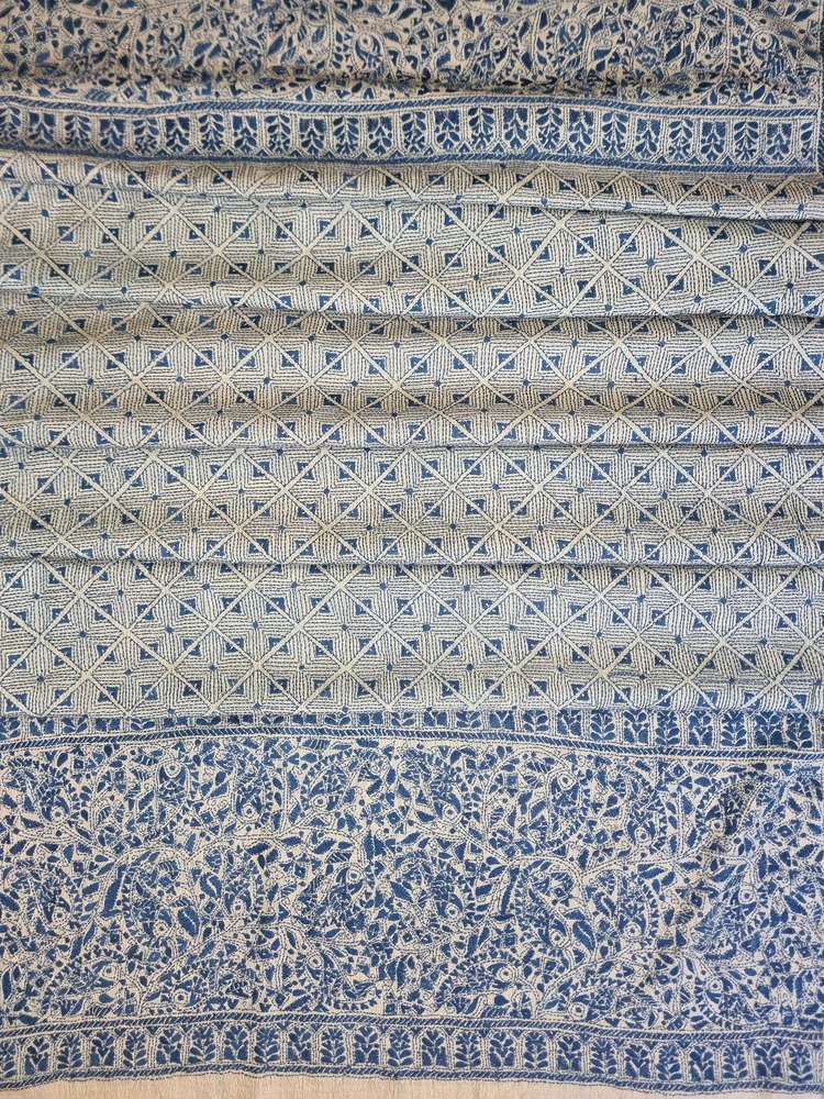 A tussar silk scarf/shawl hand-embroidered with traditional motifs by a NGO in West Bengal
