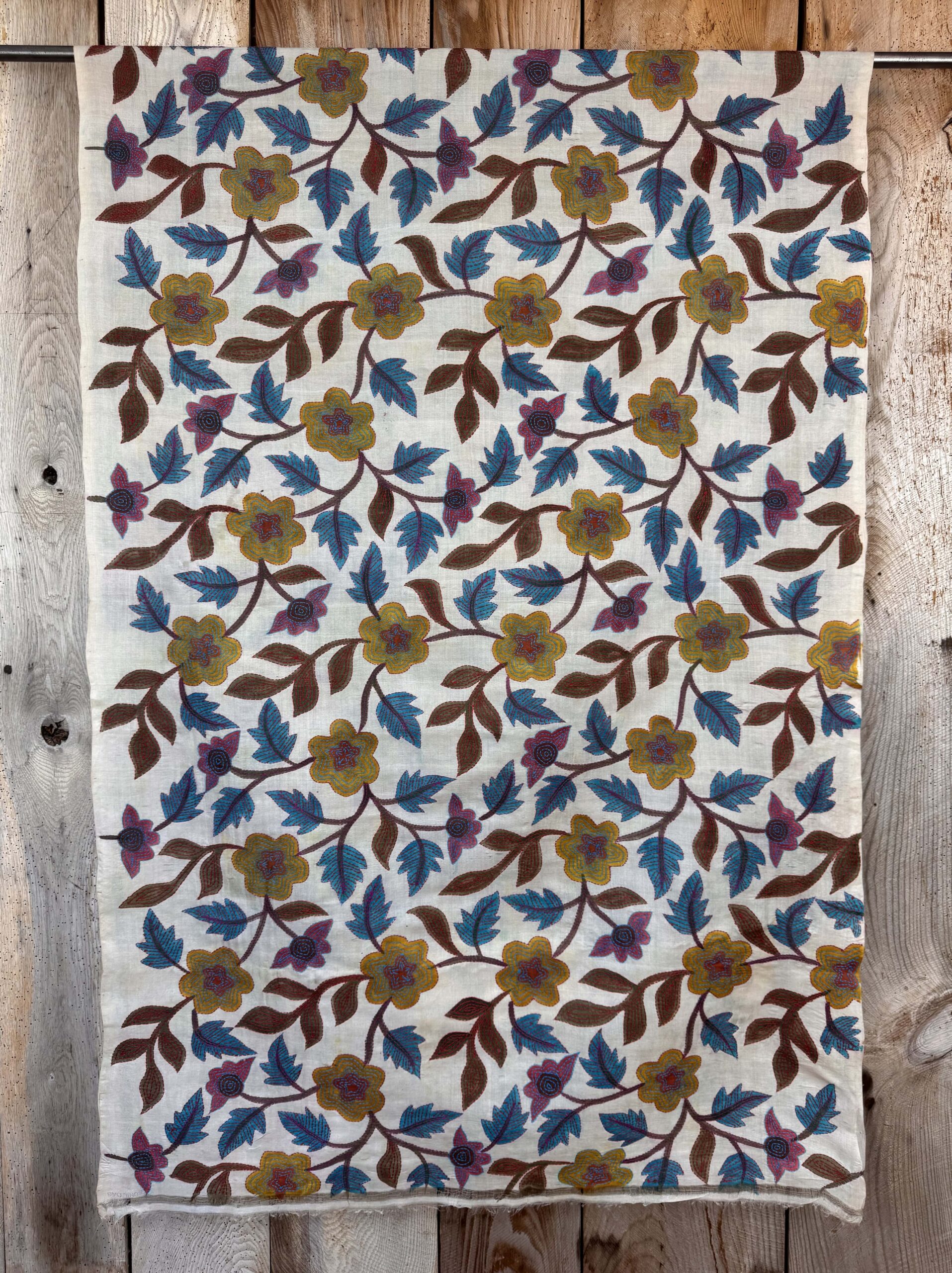 A tussar silk scarf/shawl hand-embroidered with traditional motifs by a NGO in West Bengal