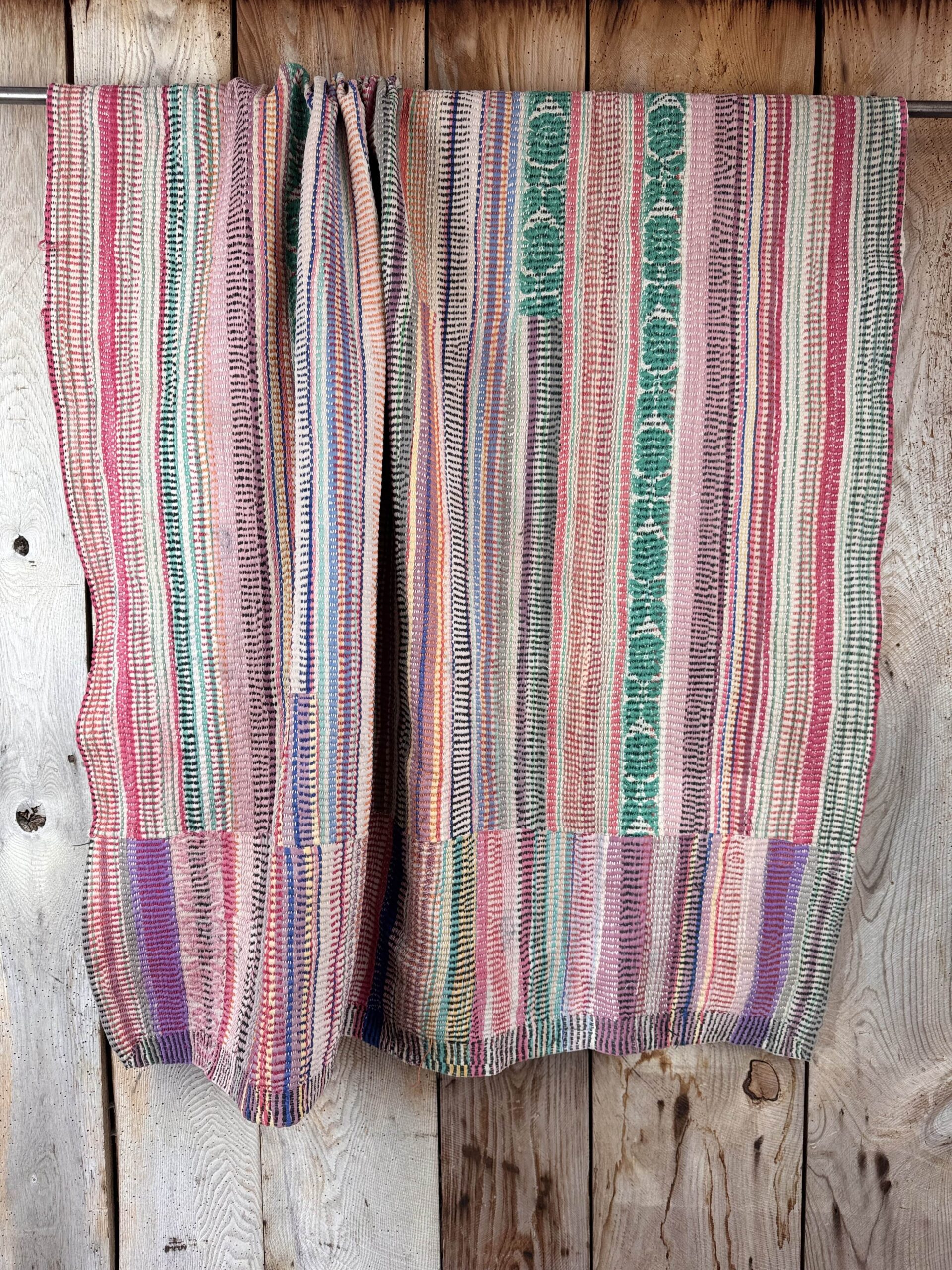 Exquisite vintage Kantha quilt featuring authentic hand-stitched Indian patchwork, responsibly sourced and perfect as unique homeware.