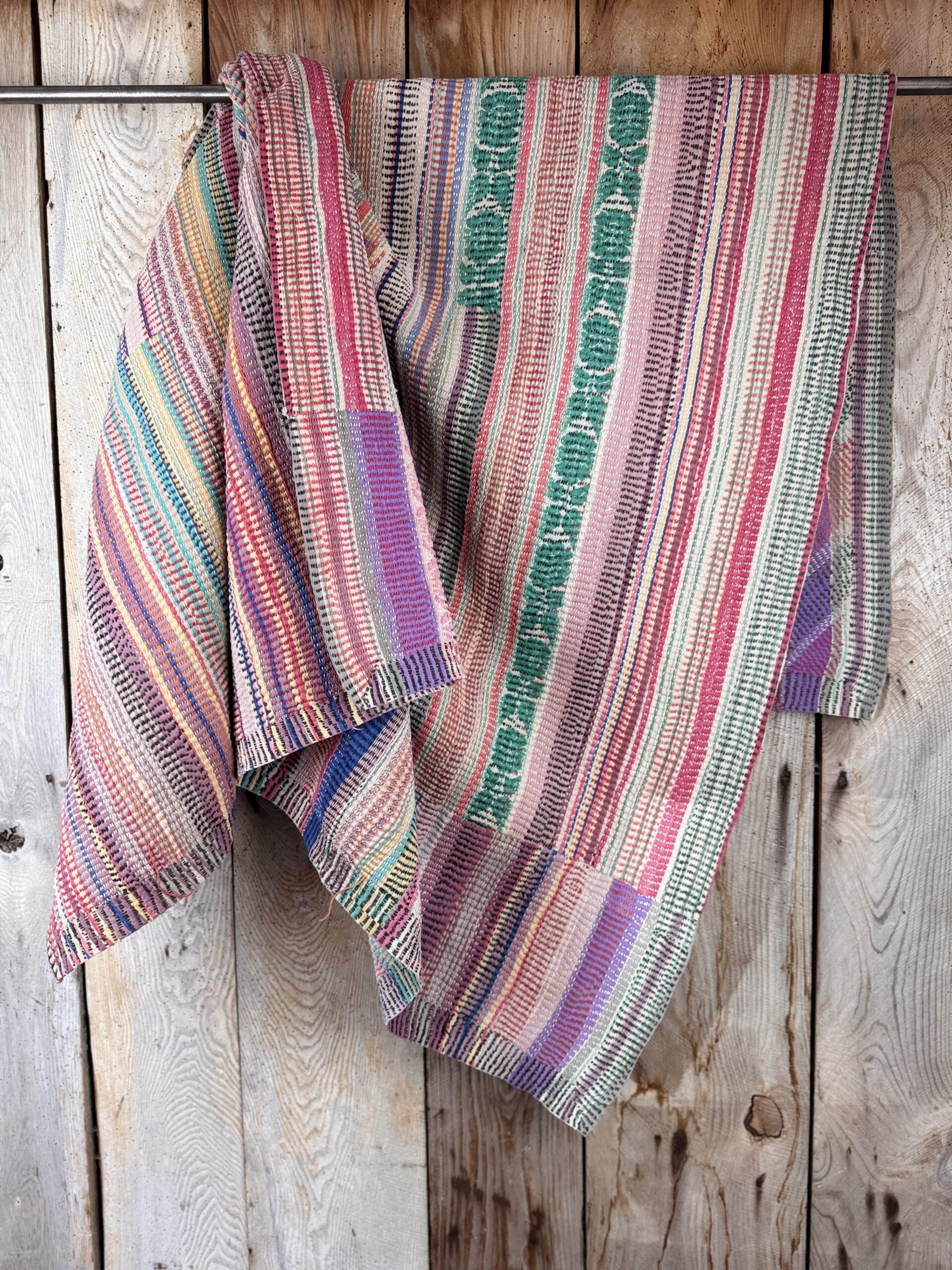 Exquisite vintage Kantha quilt featuring authentic hand-stitched Indian patchwork, responsibly sourced and perfect as unique homeware.