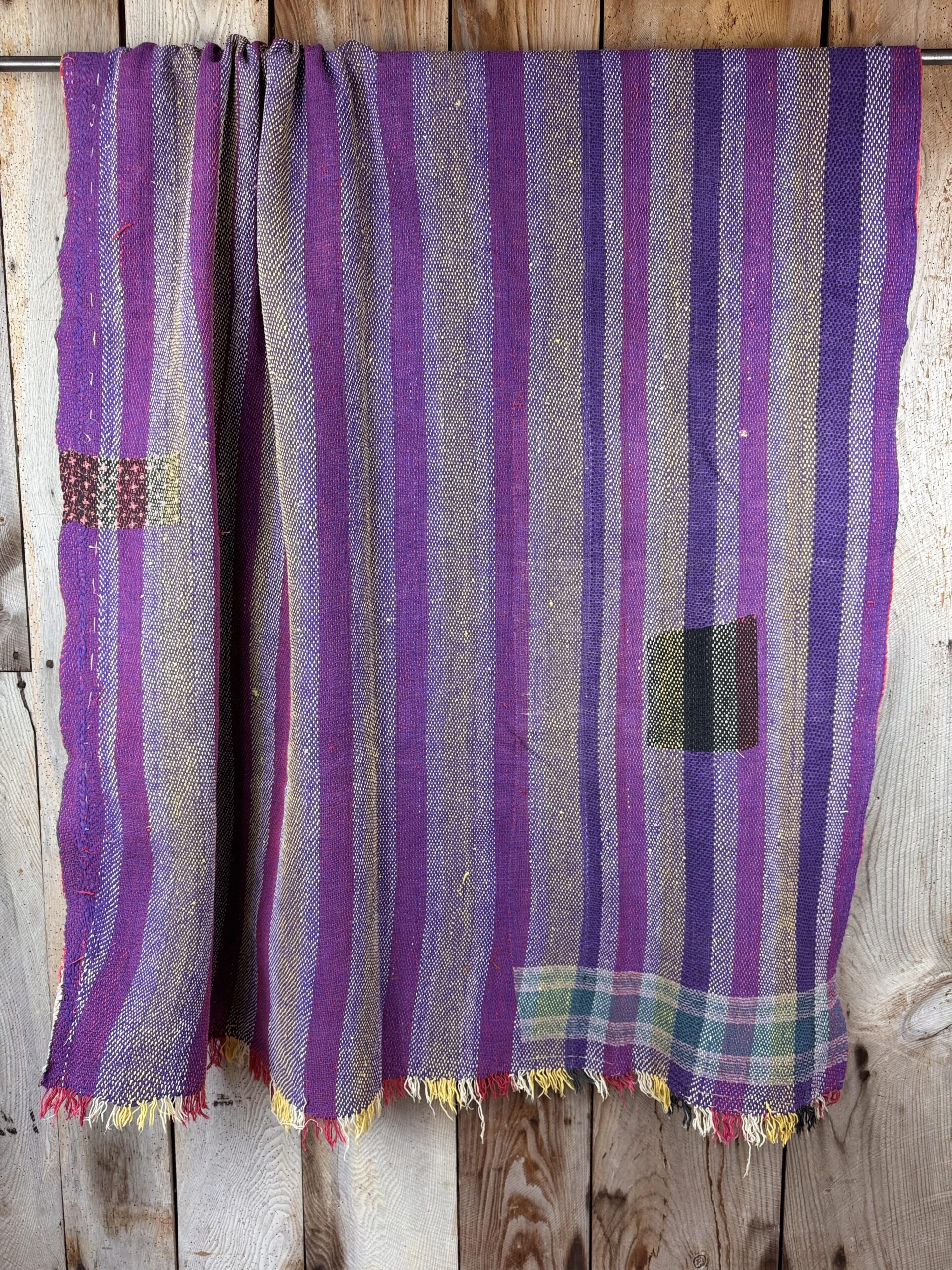 Exquisite vintage Kantha quilt featuring authentic hand-stitched Indian patchwork, responsibly sourced and perfect as unique homeware.