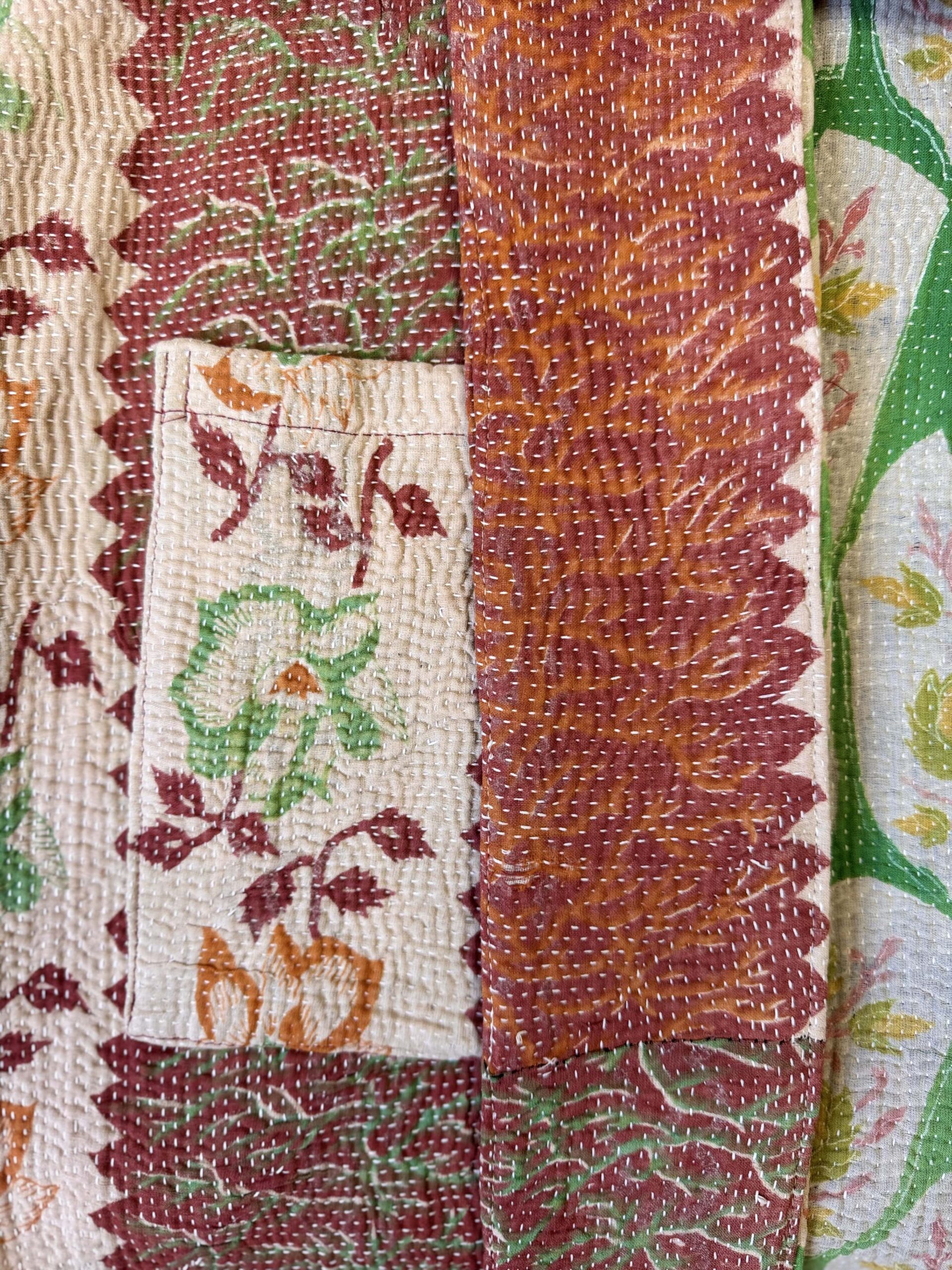 Vintage cotton Kantha Jacket with finely hand stitched details, rich textures and colours.