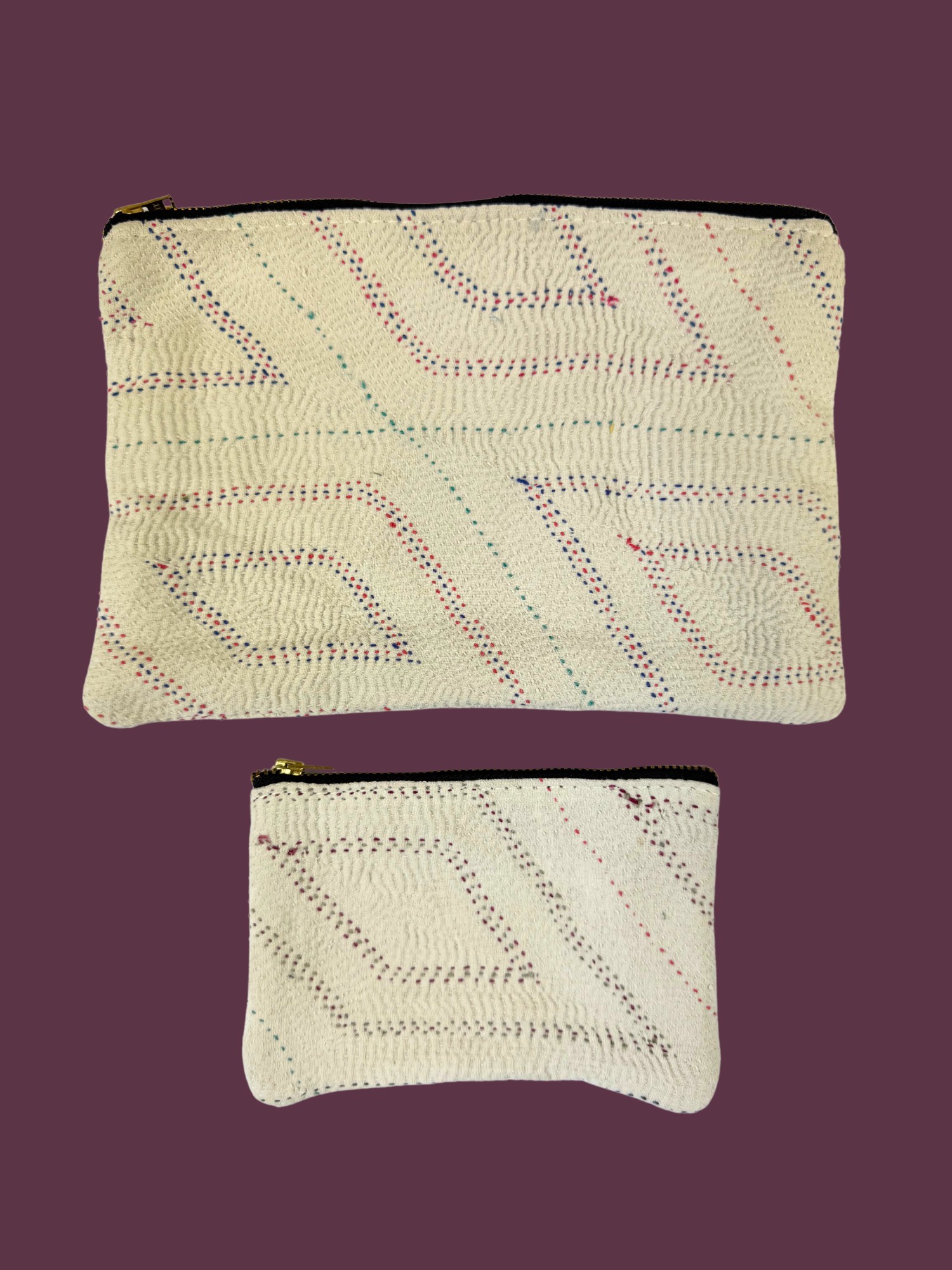 Colourful cotton kantha bags, pockets and purses, great for organising the smaller things in life. Made from recycled kantha quilts for the perfect accessory.