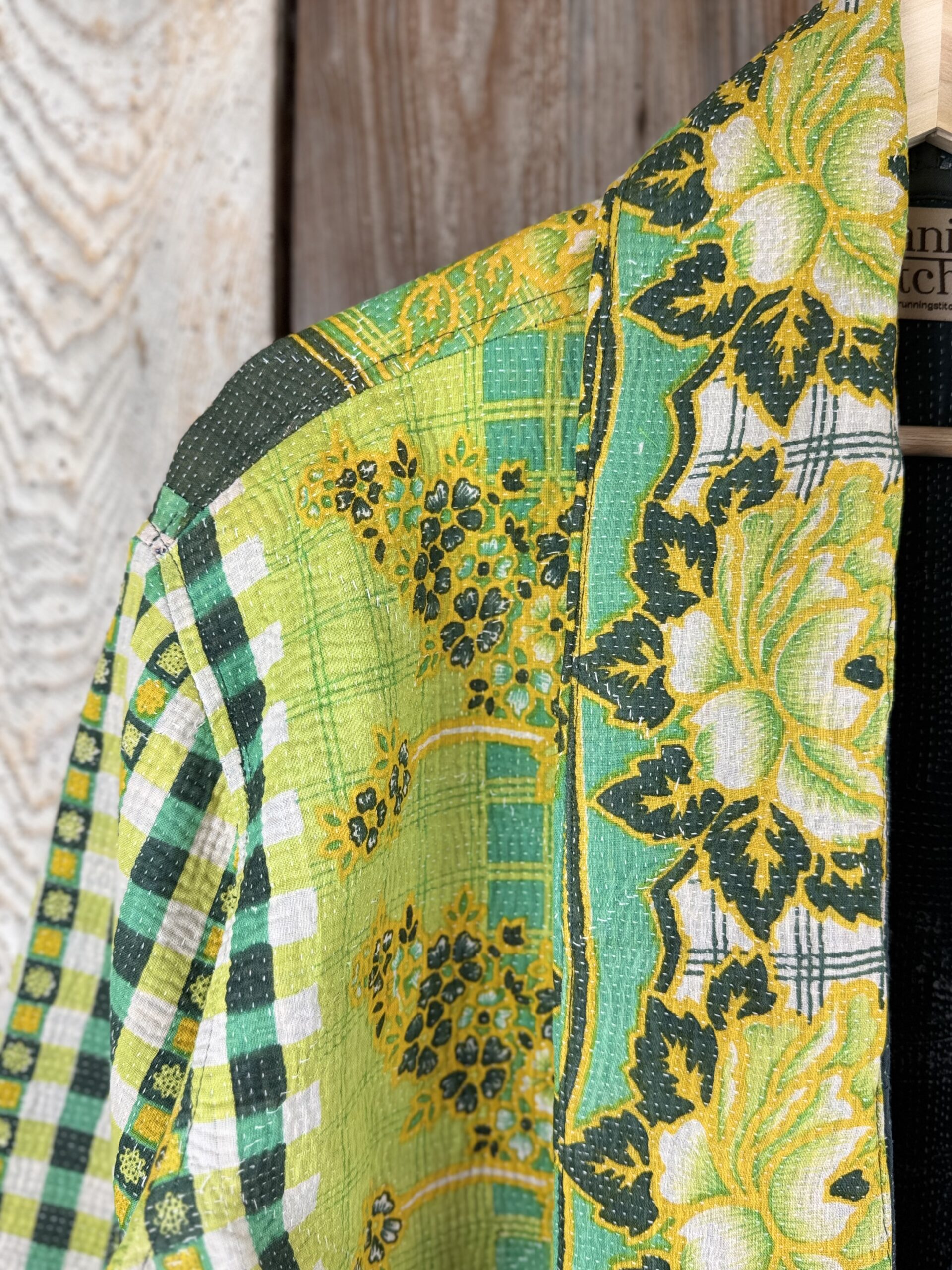 Vintage cotton Kantha Jacket with finely hand stitched details, rich textures and colours.