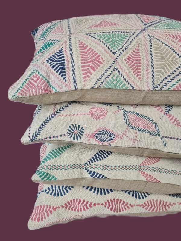 Exquisite vintage Kantha cushion featuring authentic hand-stitched Indian embroidery, responsibly sourced and perfect as unique homeware.