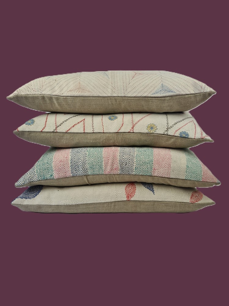 Exquisite vintage Kantha cushion featuring authentic hand-stitched Indian embroidery, responsibly sourced and perfect as unique homeware.