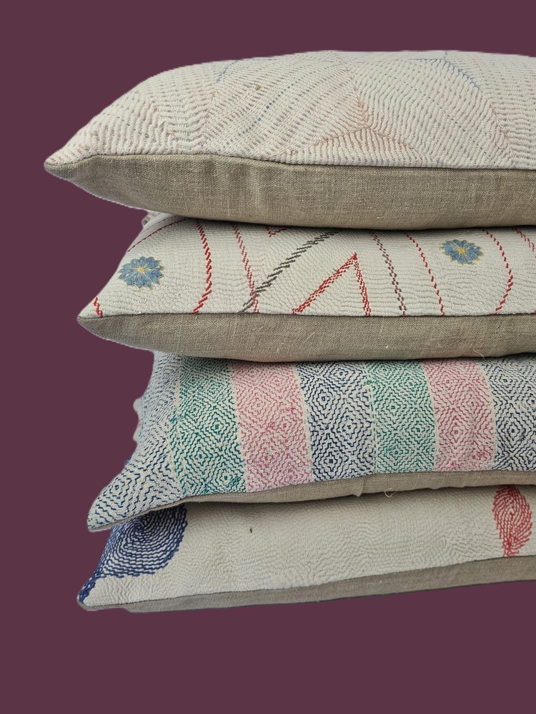 Exquisite vintage Kantha cushion featuring authentic hand-stitched Indian embroidery, responsibly sourced and perfect as unique homeware.