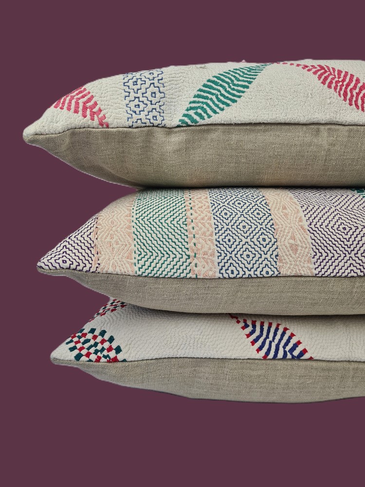 Exquisite vintage Kantha cushion featuring authentic hand-stitched Indian embroidery, responsibly sourced and perfect as unique homeware.