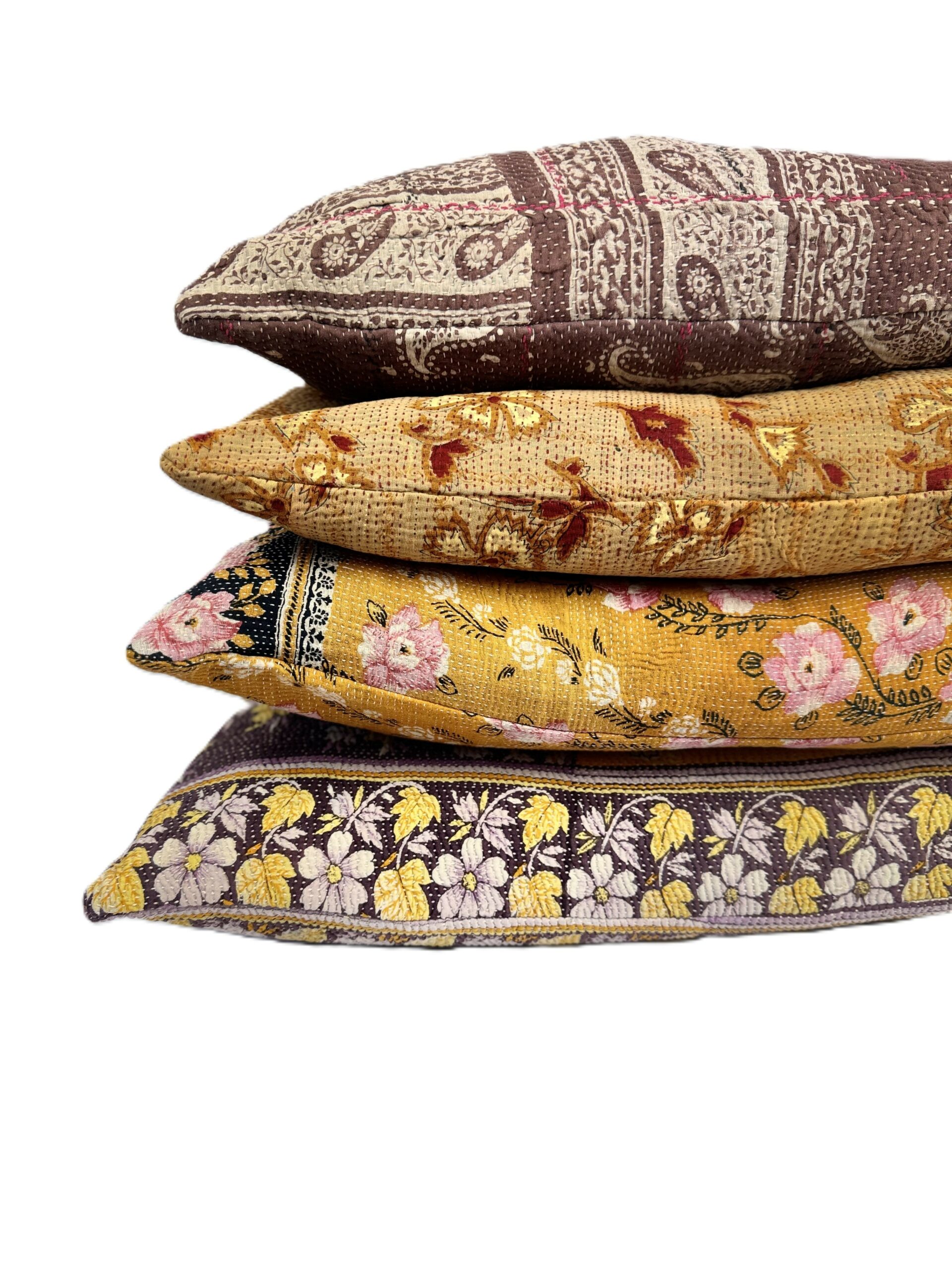Exquisite vintage Kantha cushion featuring authentic hand-stitched Indian embroidery, responsibly sourced and perfect as unique homeware.