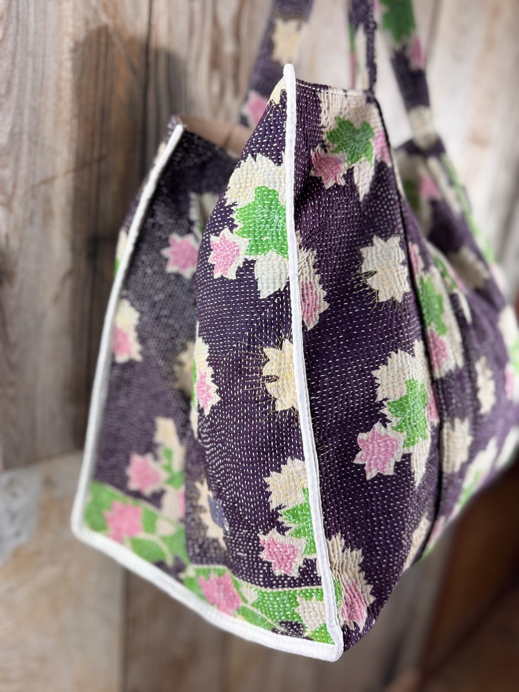 Colourful cotton kantha bags, pockets and purses, great for organising the smaller things in life. Made from recycled kantha quilts for the perfect accessory.