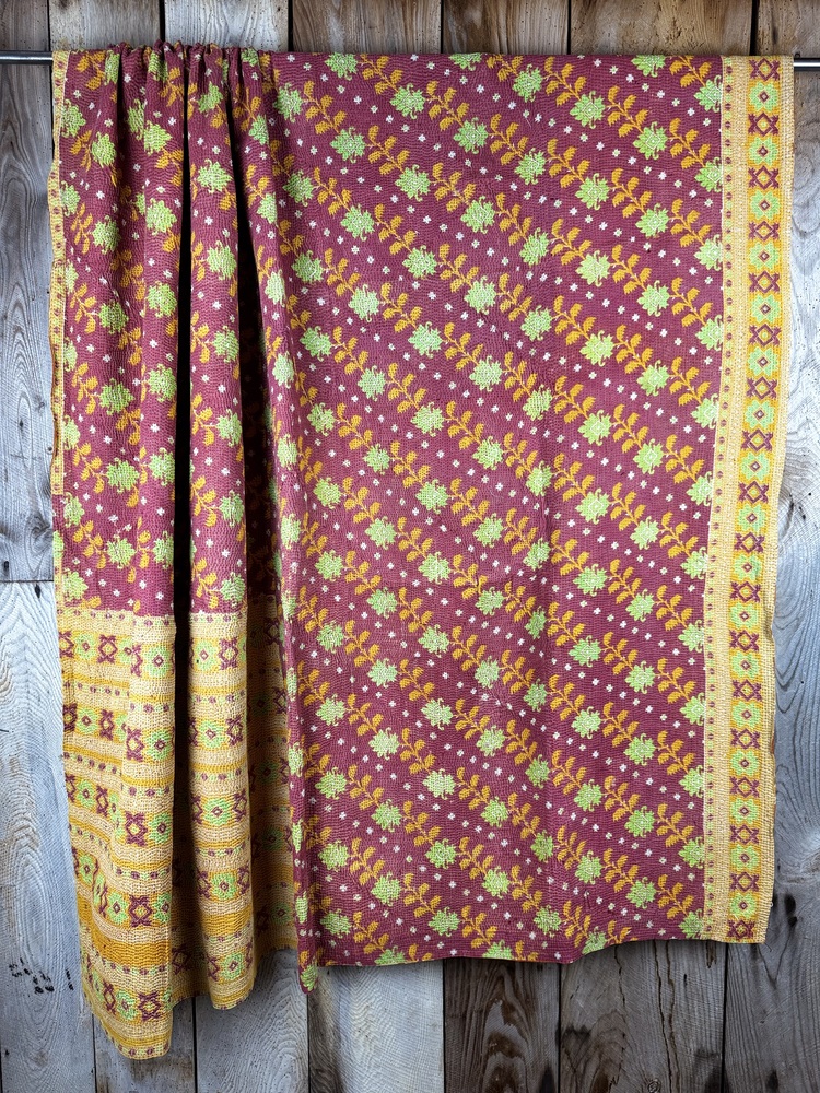Exquisite vintage Kantha quilt featuring authentic hand-stitched Indian patchwork, responsibly sourced and perfect as unique homeware.