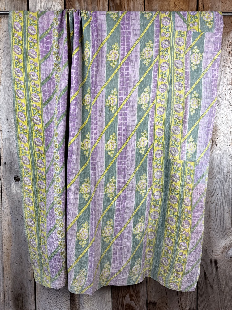 Exquisite vintage Kantha quilt featuring authentic hand-stitched Indian patchwork, responsibly sourced and perfect as unique homeware.