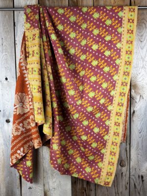 Exquisite vintage Kantha quilt featuring authentic hand-stitched Indian patchwork, responsibly sourced and perfect as unique homeware.