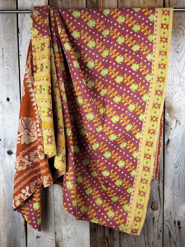 Exquisite vintage Kantha quilt featuring authentic hand-stitched Indian patchwork, responsibly sourced and perfect as unique homeware.
