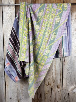 Exquisite vintage Kantha quilt featuring authentic hand-stitched Indian patchwork, responsibly sourced and perfect as unique homeware.