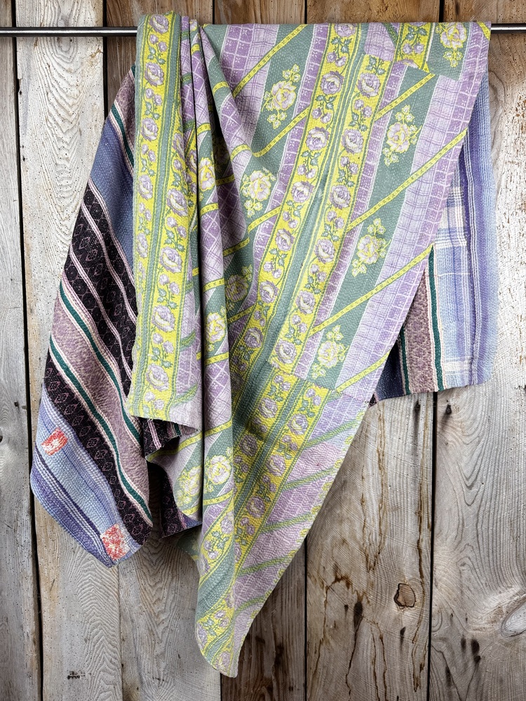 Exquisite vintage Kantha quilt featuring authentic hand-stitched Indian patchwork, responsibly sourced and perfect as unique homeware.