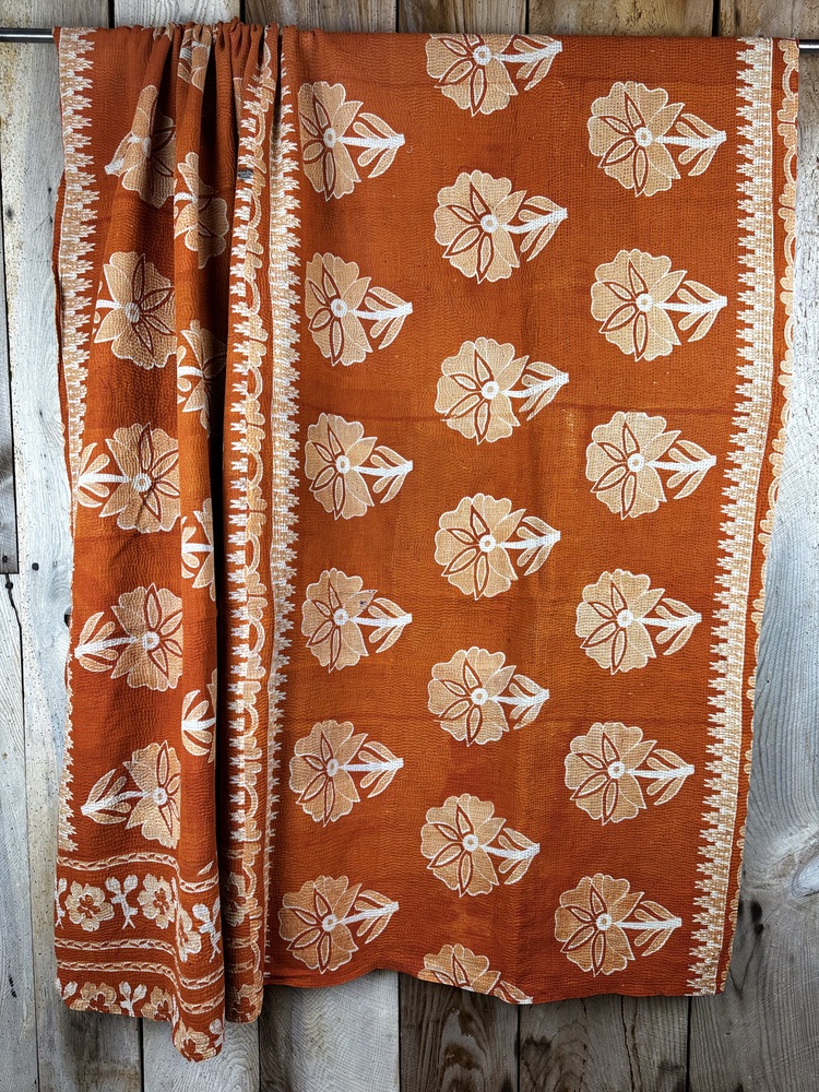 Exquisite vintage Kantha quilt featuring authentic hand-stitched Indian patchwork, responsibly sourced and perfect as unique homeware.
