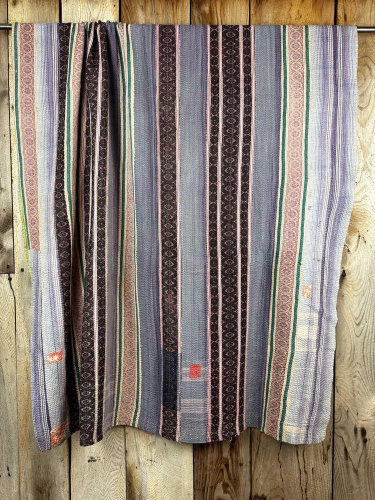 Exquisite vintage Kantha quilt featuring authentic hand-stitched Indian patchwork, responsibly sourced and perfect as unique homeware.