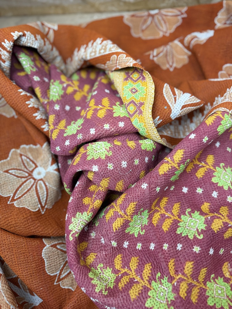 Exquisite vintage Kantha quilt featuring authentic hand-stitched Indian patchwork, responsibly sourced and perfect as unique homeware.