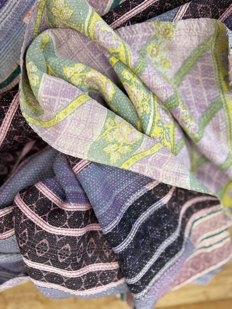 Exquisite vintage Kantha quilt featuring authentic hand-stitched Indian patchwork, responsibly sourced and perfect as unique homeware.