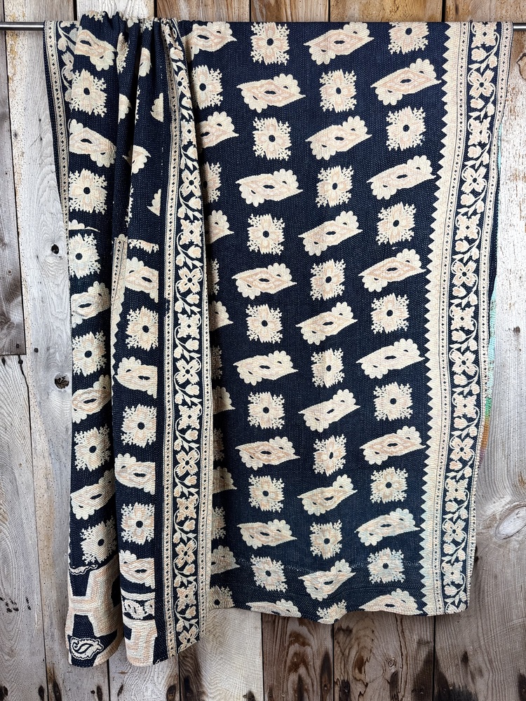 Exquisite vintage Kantha quilt featuring authentic hand-stitched Indian patchwork, responsibly sourced and perfect as unique homeware.