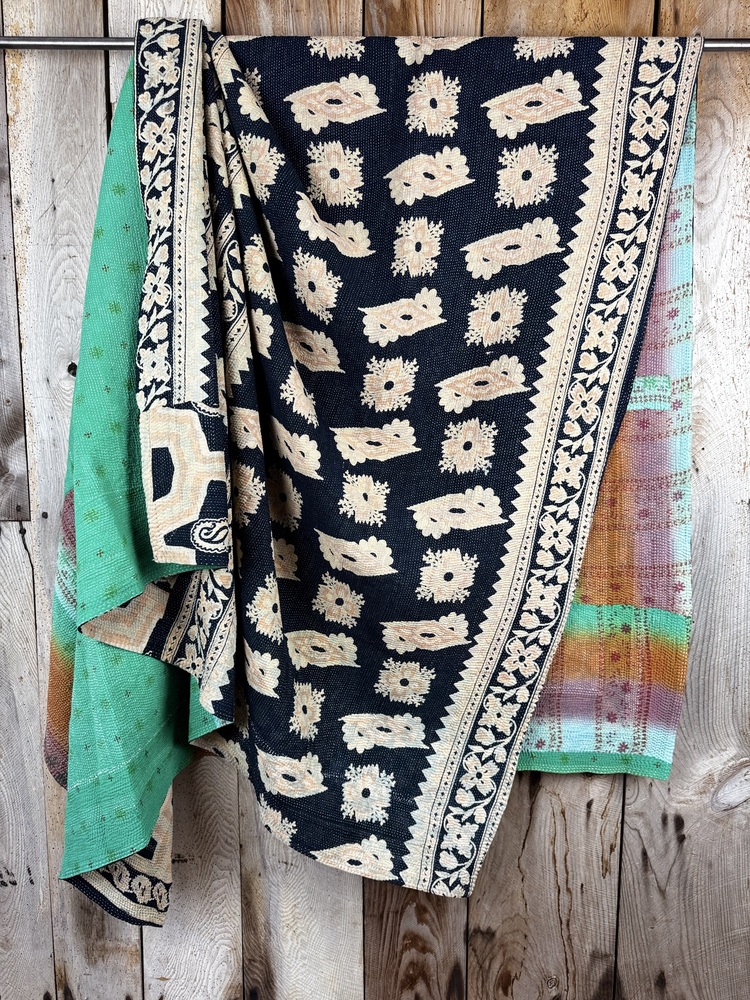 Exquisite vintage Kantha quilt featuring authentic hand-stitched Indian patchwork, responsibly sourced and perfect as unique homeware.