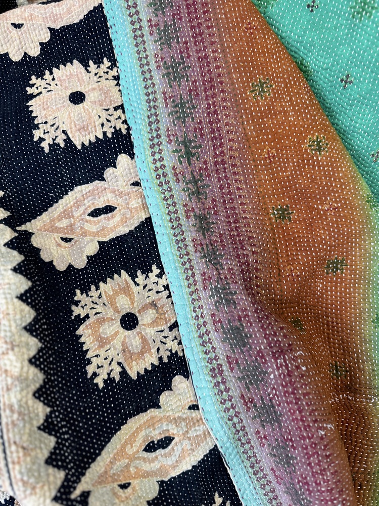 Exquisite vintage Kantha quilt featuring authentic hand-stitched Indian patchwork, responsibly sourced and perfect as unique homeware.