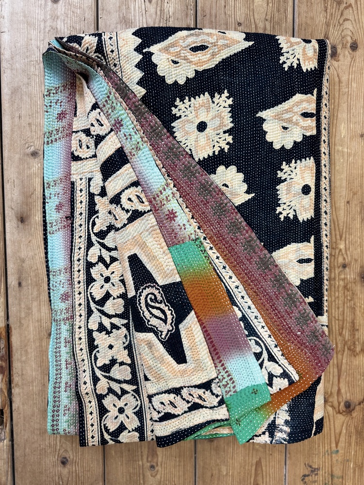 Exquisite vintage Kantha quilt featuring authentic hand-stitched Indian patchwork, responsibly sourced and perfect as unique homeware.