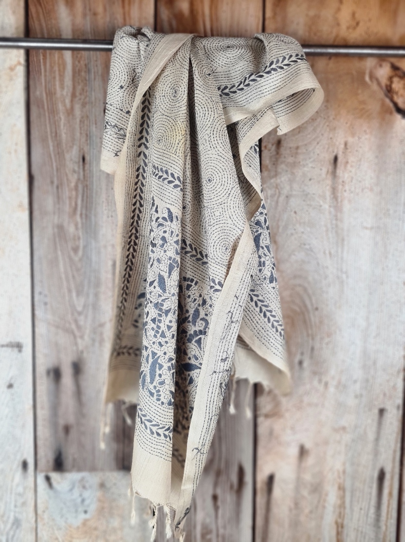 A tussar silk scarf/shawl hand-embroidered with traditional motifs by a NGO in West Bengal.