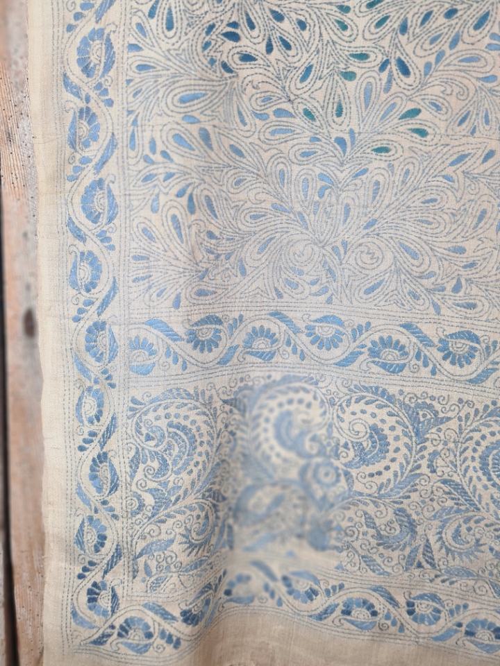 A tussar silk scarf/shawl hand-embroidered with traditional motifs by a NGO in West Bengal.