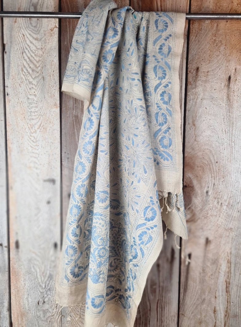 A tussar silk scarf/shawl hand-embroidered with traditional motifs by a NGO in West Bengal.